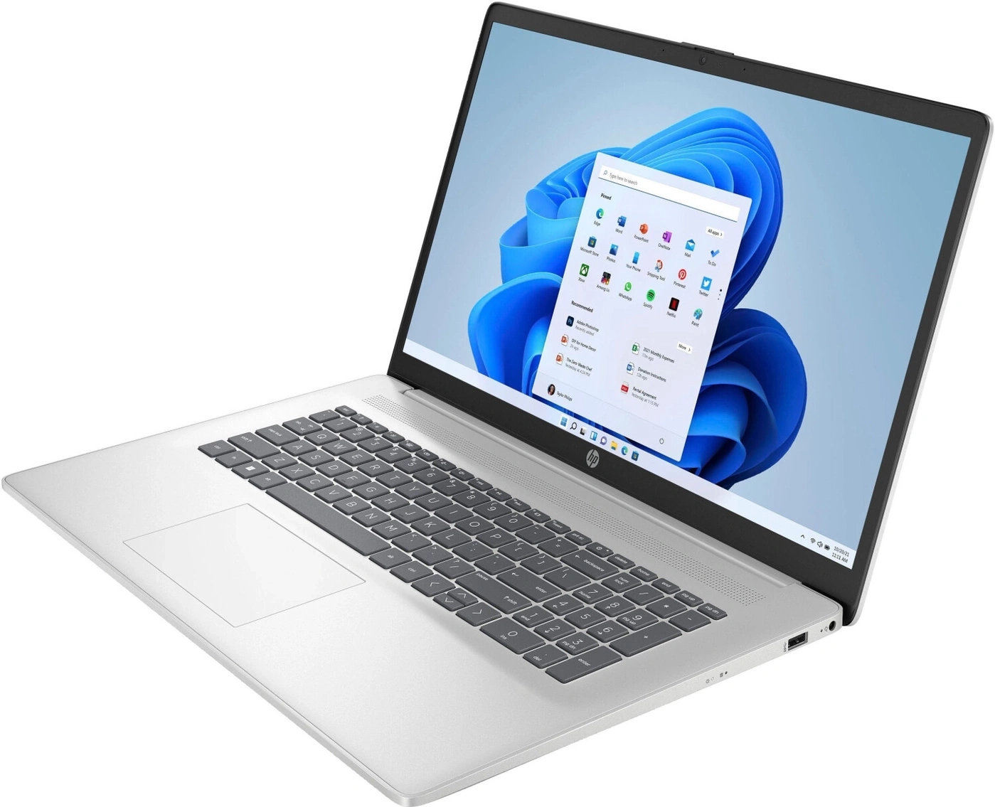 Ein silberner HP Laptop mit einem Windows 11 Startmenü auf dem Bildschirm.