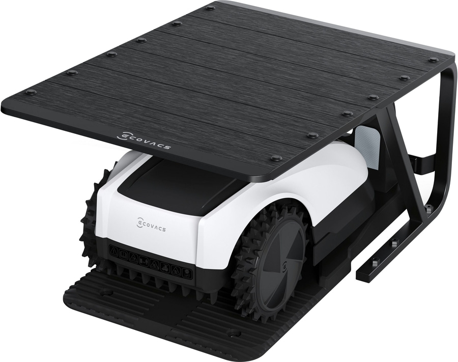 Schwarzer Roboter-Rasenmäher mit Ladestation und ECOVACS-Logo, bereit für den Einsatz im Garten.